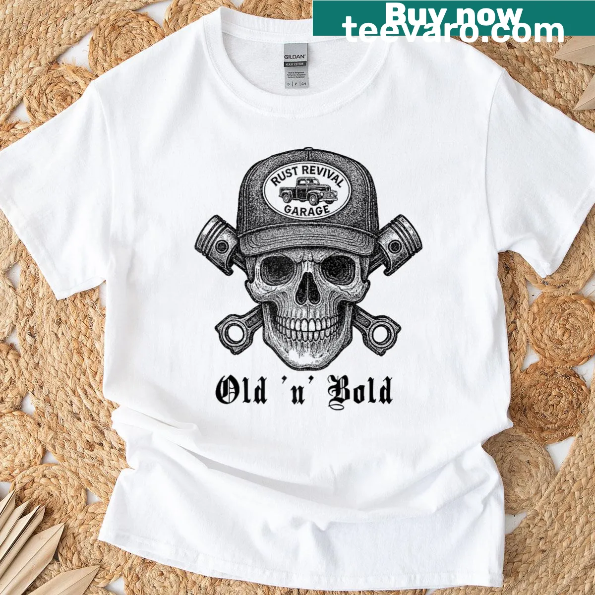 Garage-themed raglan tee with skull and crossed pistons graphic — on a men's t-shirt