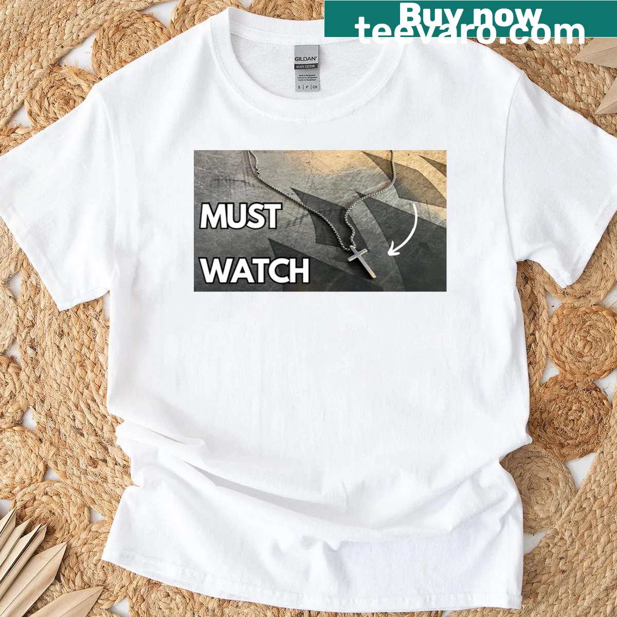 Minimalist T-shirt featuring a silhouette of a cross design. — on a men's t-shirt