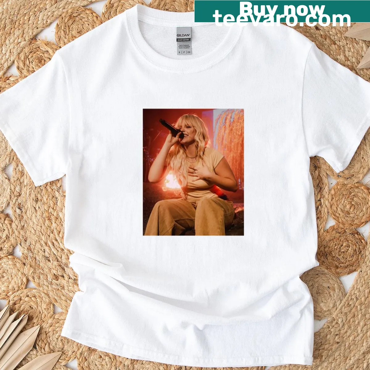 Illustration of Renee Rapp on a vibrant orange T-shirt. — on a men's t-shirt