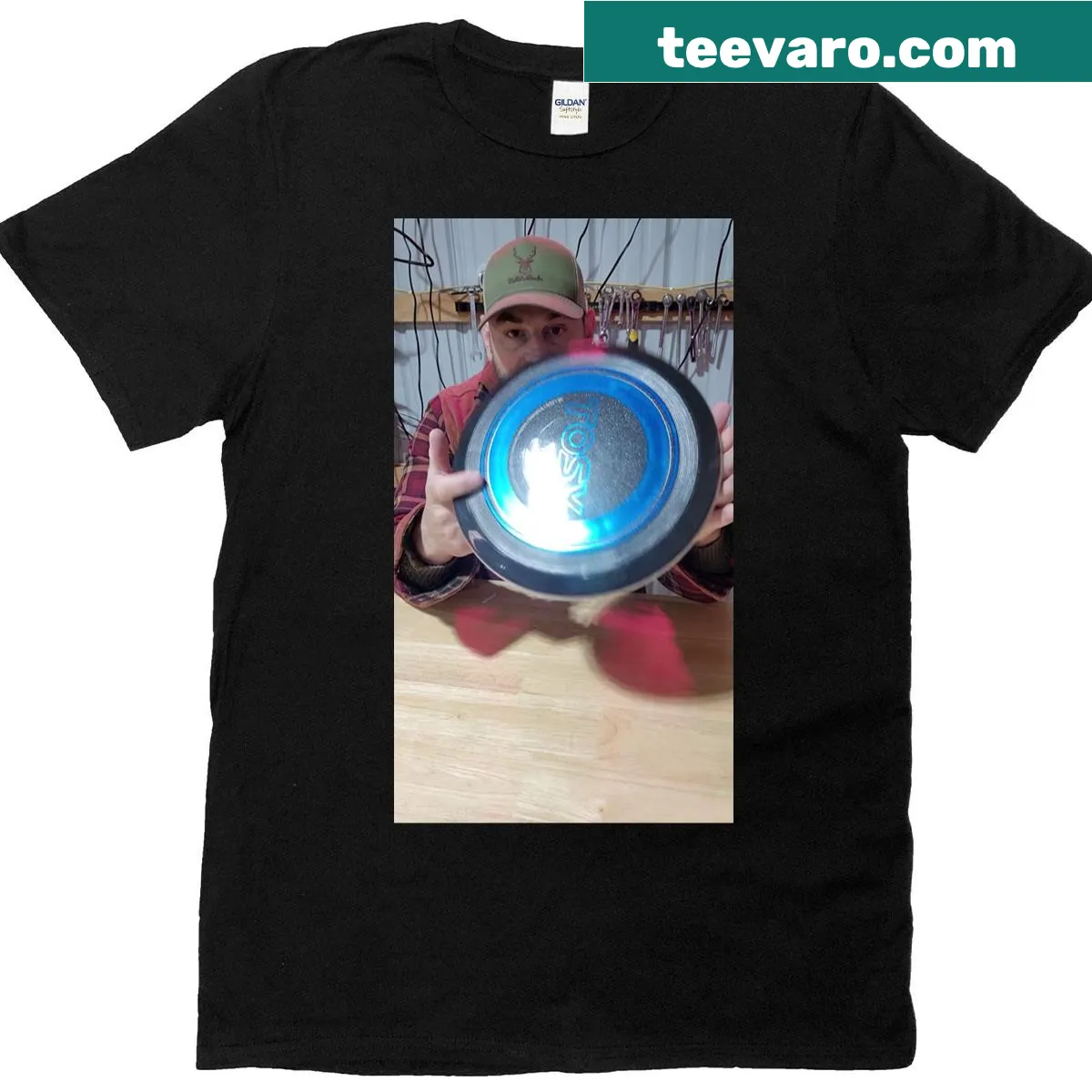 Graphic t-shirt featuring a flying disc design — on a men's t-shirt