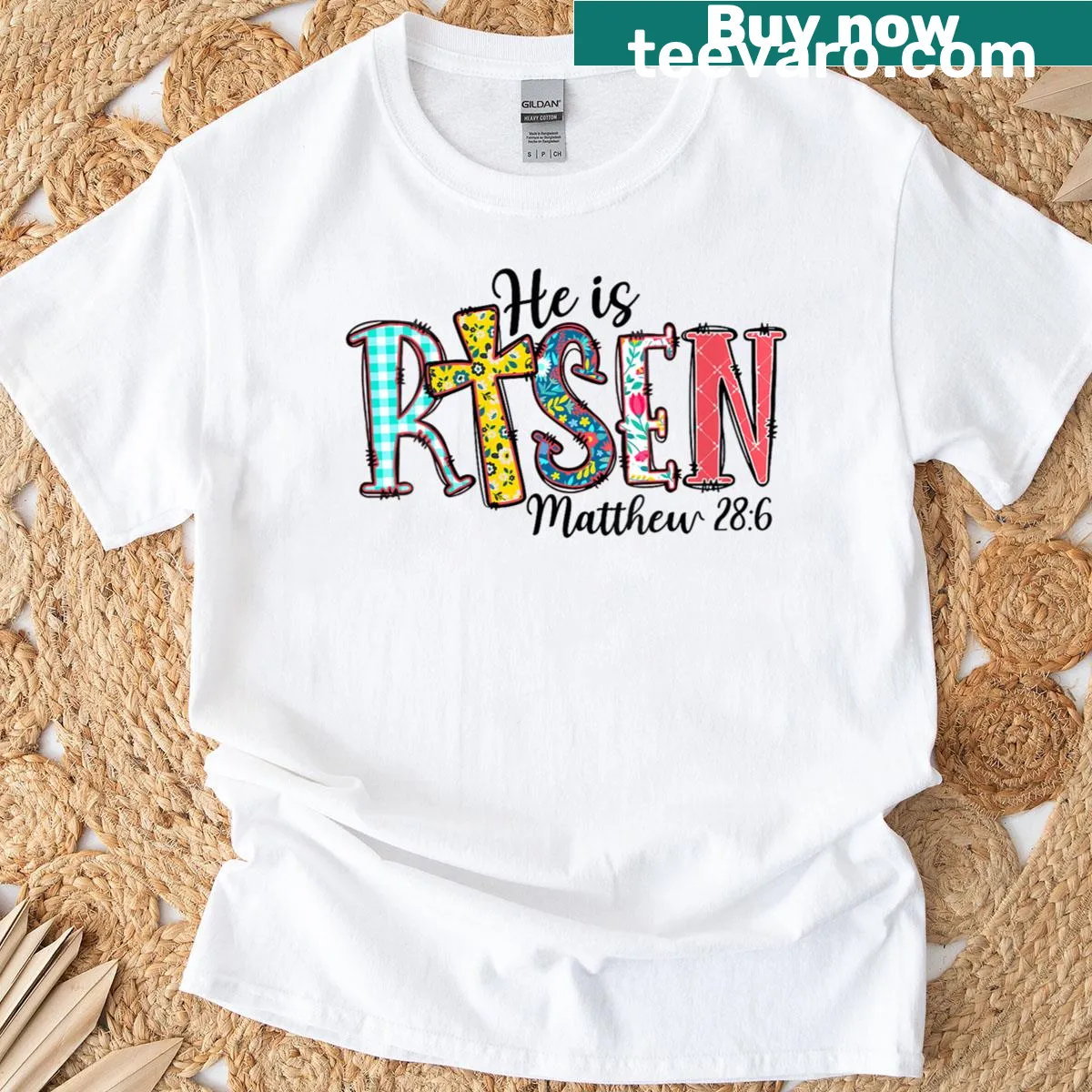 Inspirational Easter shirt featuring Matthew 28:6, 'He Is Risen' in bold text. — on a men's t-shirt