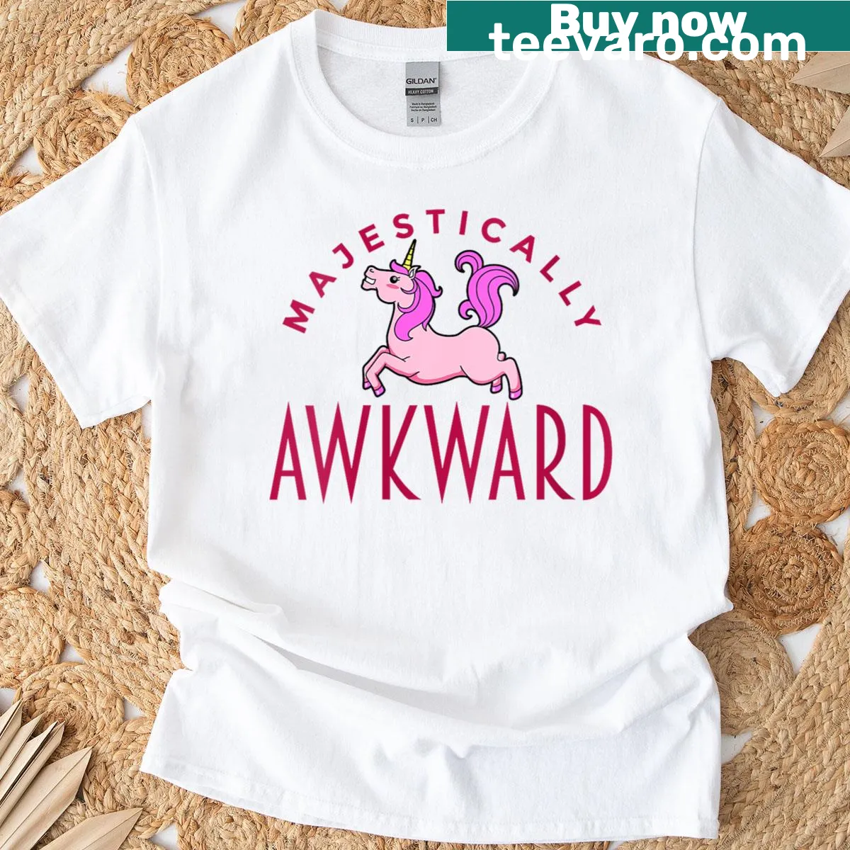 Whimsical T-shirt featuring an awkward unicorn design promoting kindness. — on a men's t-shirt