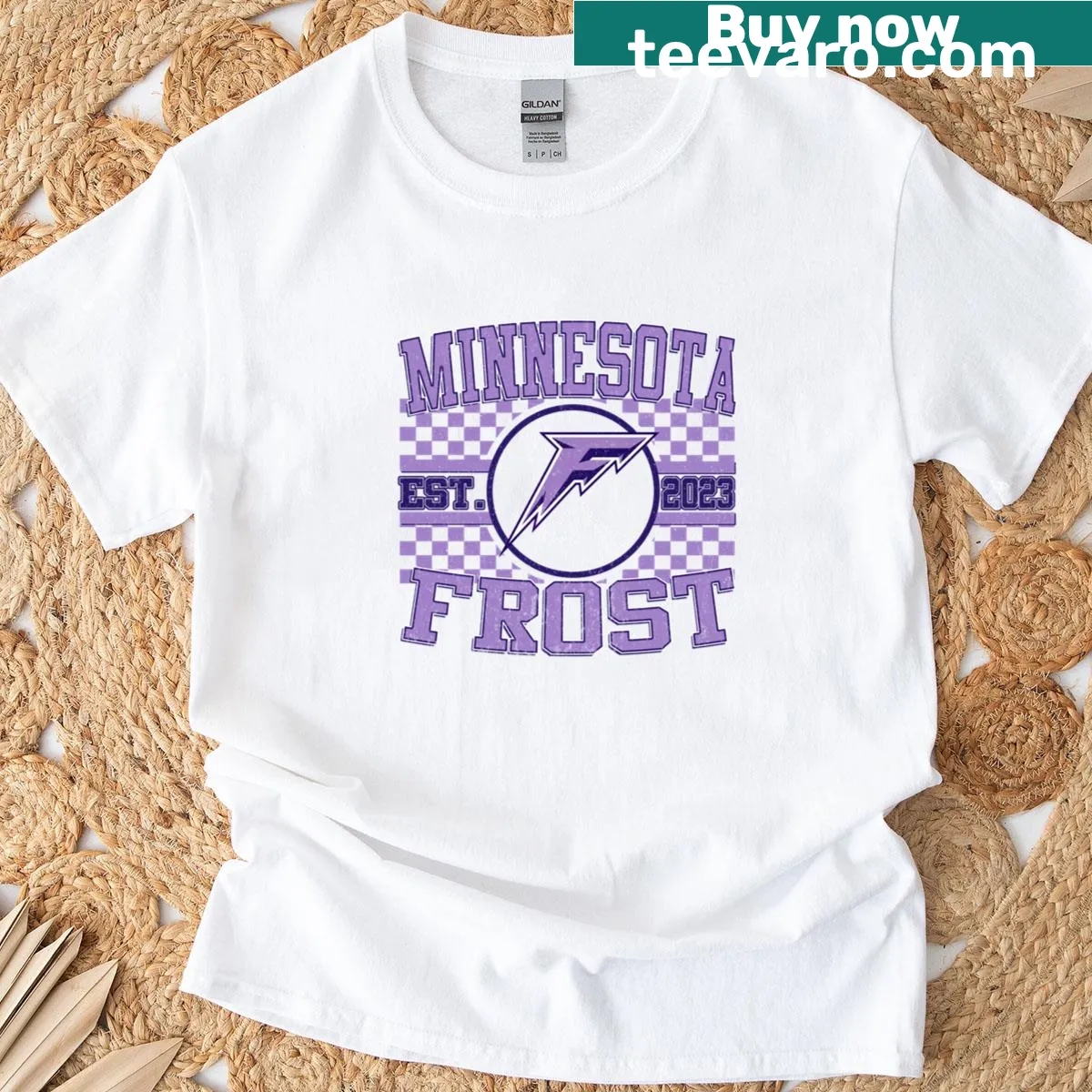 Distressed Minnesota Frost PWHL ice hockey T-shirt — on a men's t-shirt