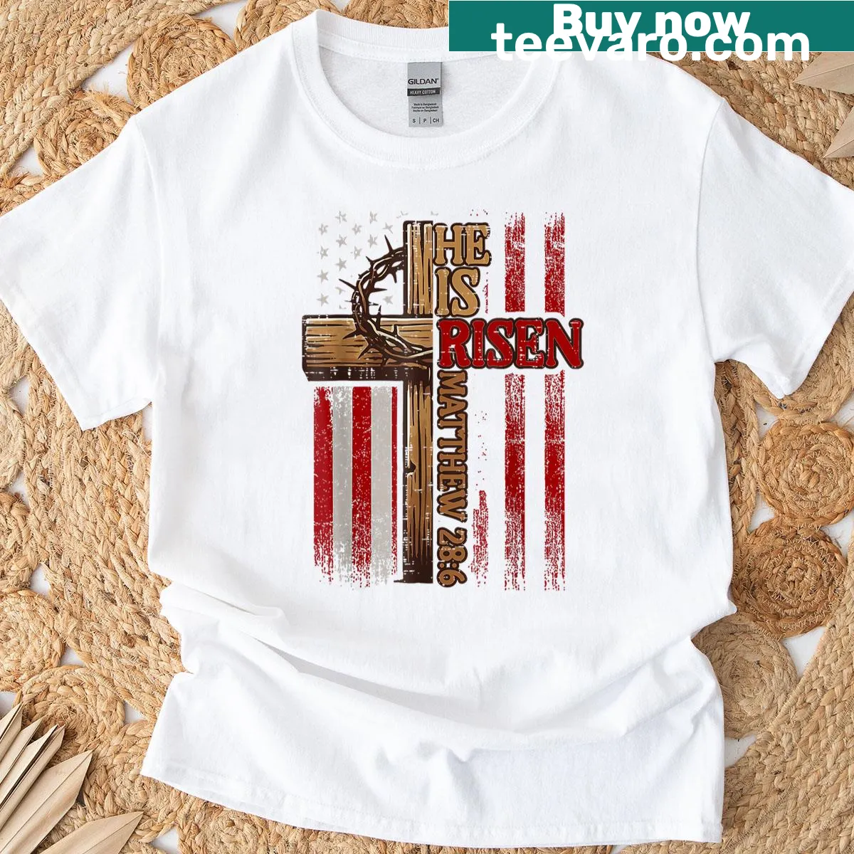 Inspiring Easter t-shirt with cross design and text 'He Is Risen' — on a men's t-shirt