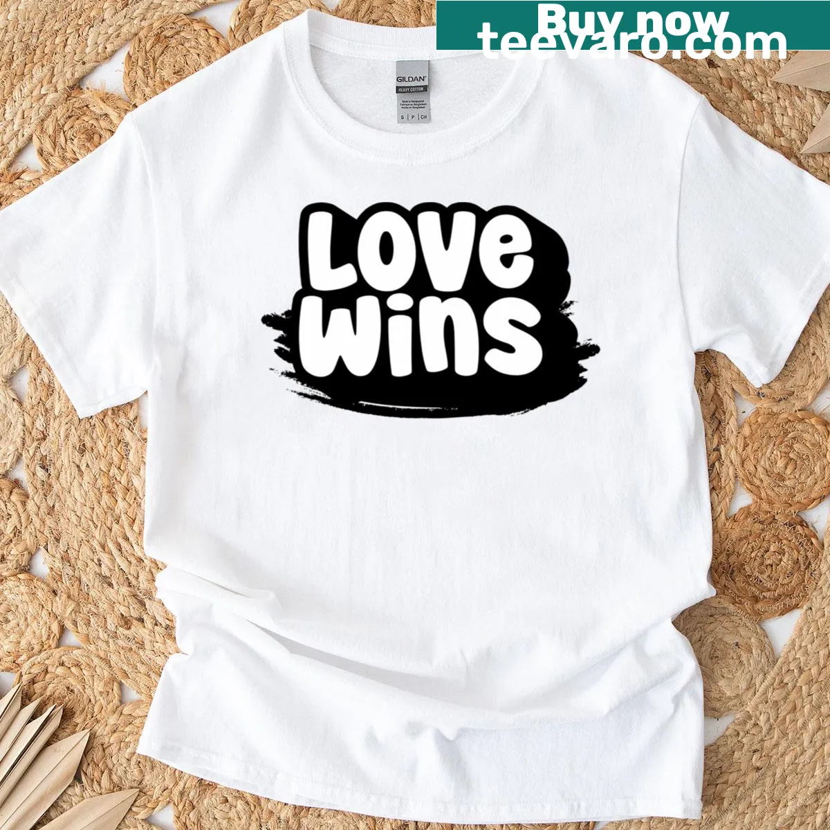 Inspirational Love Wins typography graphic on a t-shirt — on a men's t-shirt