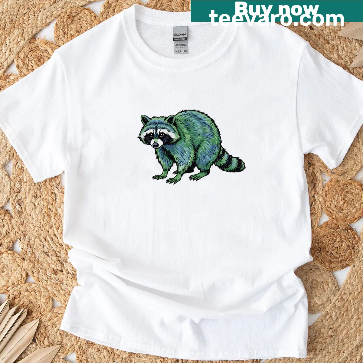 Cartoon raccoon graphic T-shirt with a playful expression — on a men's t-shirt