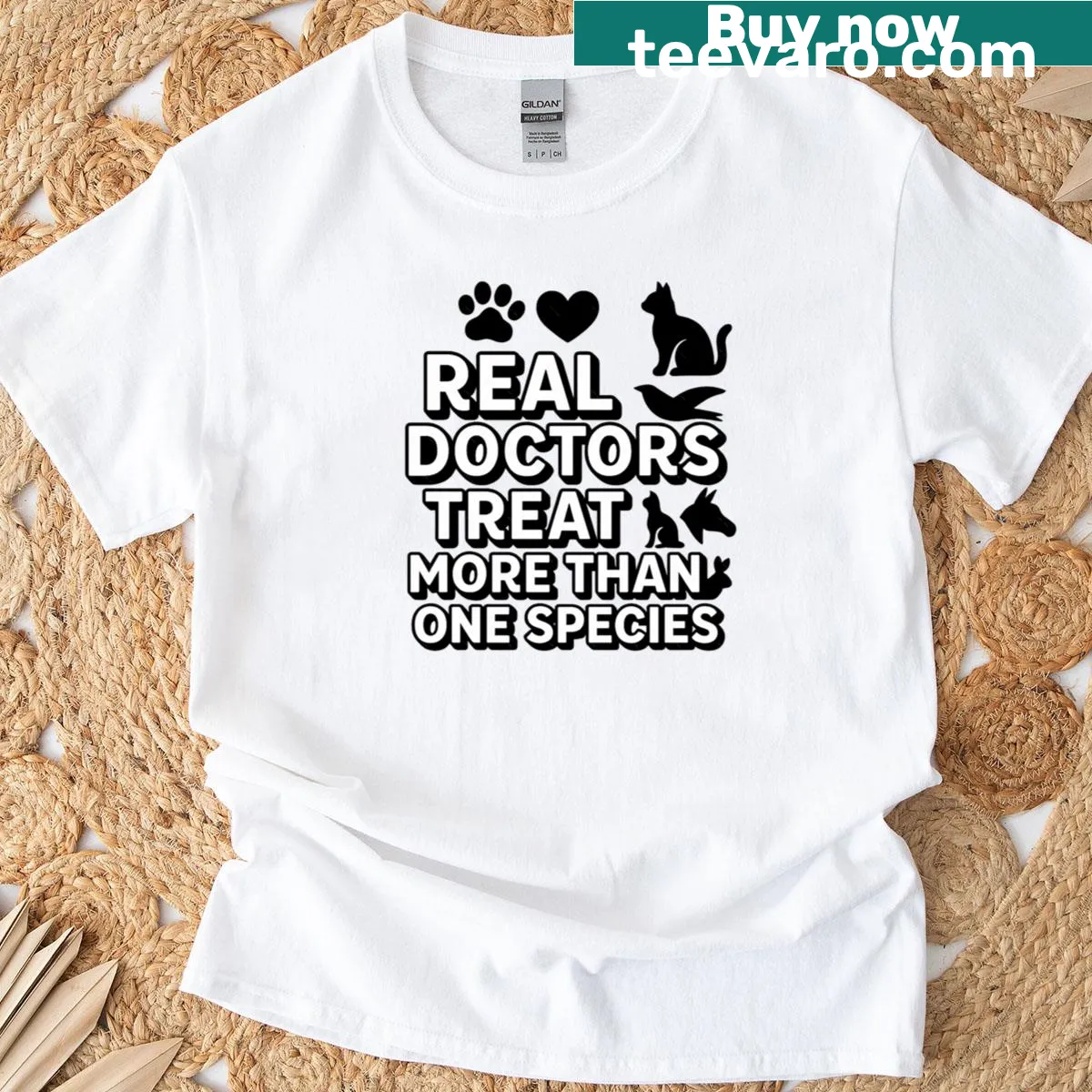Vet pride T-shirt stating real doctors treat more than one species — on a men's t-shirt