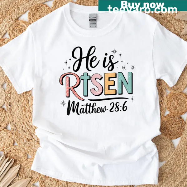 Easter shirt featuring 'He Is Risen' text and illustrations for girls