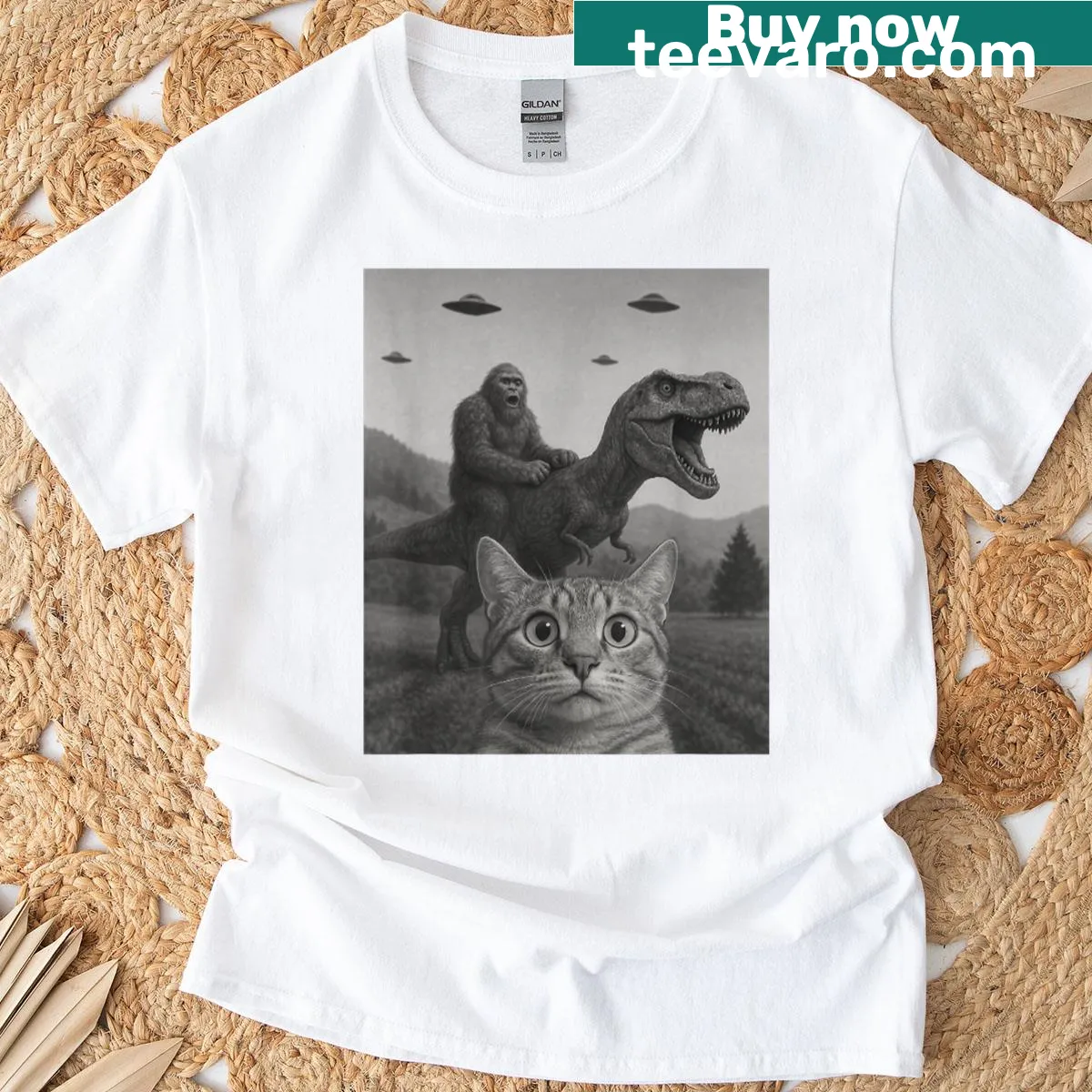 Funny T-shirt featuring a cat selfie with Bigfoot, T-rex, and alien UFO — on a men's t-shirt