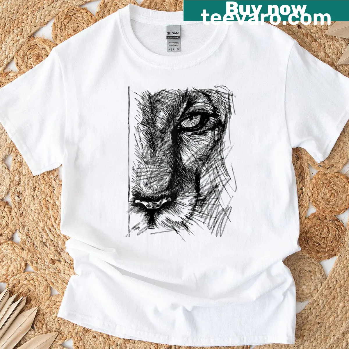 Illustration of a lioness's face symbolizing strength and leadership — on a men's t-shirt