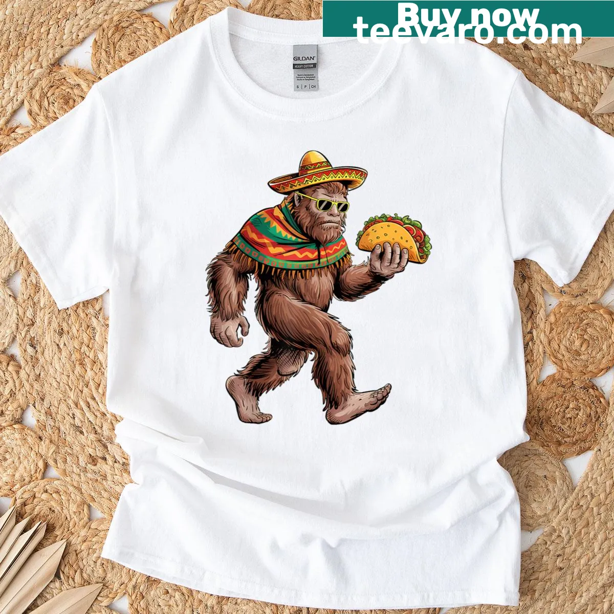 Sasquatch in sombrero and poncho carrying a taco graphic T-shirt — on a men's t-shirt