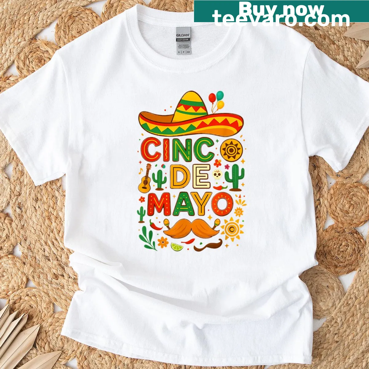 Cinco De Mayo T-shirt featuring tacos and guitars in a festive design — on a men's t-shirt