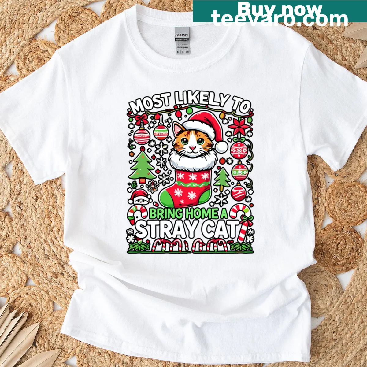 Christmas T-shirt with the saying 'Most Likely To Bring Home A Stray Cat'. — on a men's t-shirt