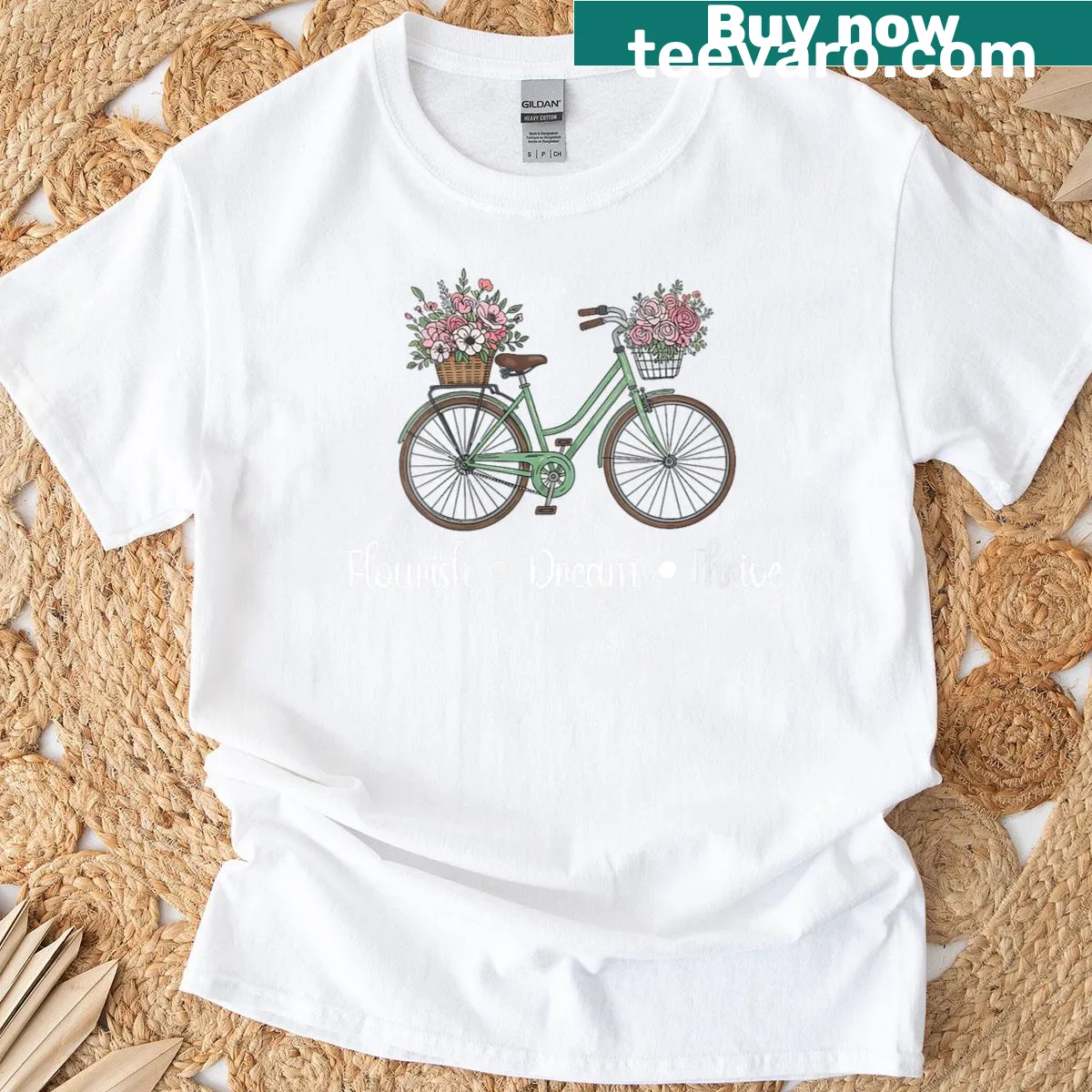 Floral bike design encouraging flourishing and dreaming — on a men's t-shirt