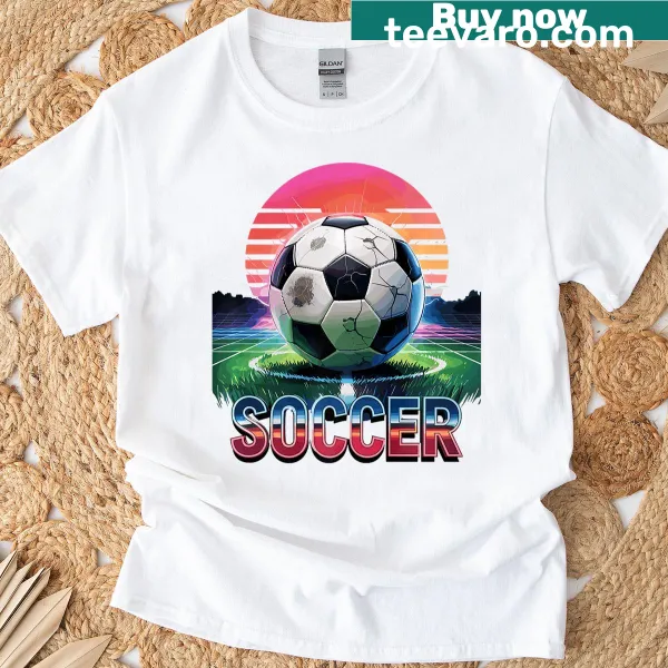 Vintage soccer player T-shirt featuring soccer ball and goal design.