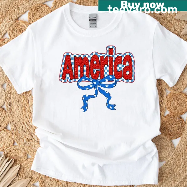 Playful T-shirt with American flag and bow design for patriotic events.