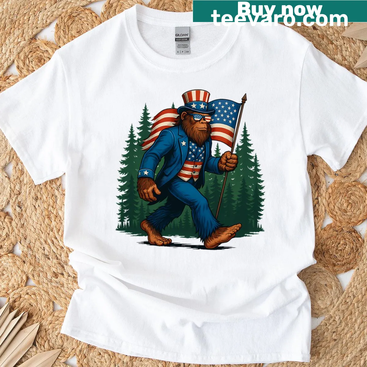 Bigfoot illustration draped in American flag T-shirt — on a men's t-shirt