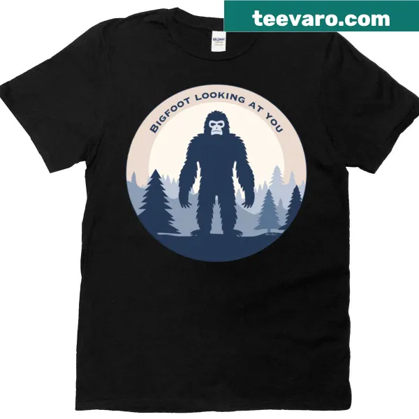 Whimsical Bigfoot illustration in forest on T-shirt