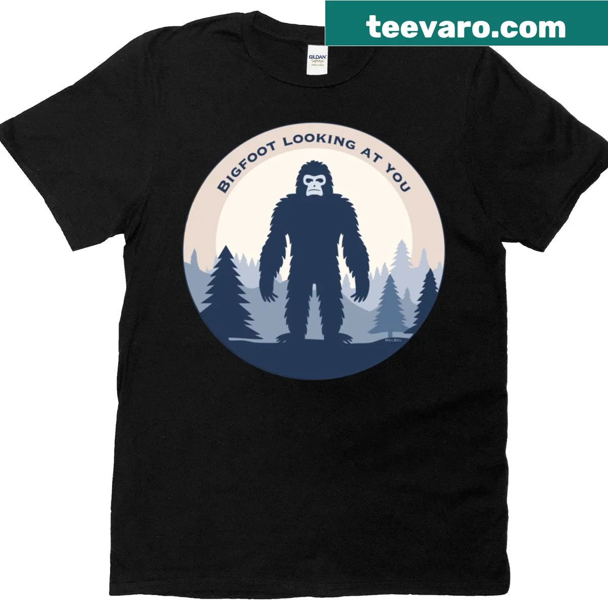Whimsical Bigfoot illustration in forest on T-shirt — on a men's t-shirt