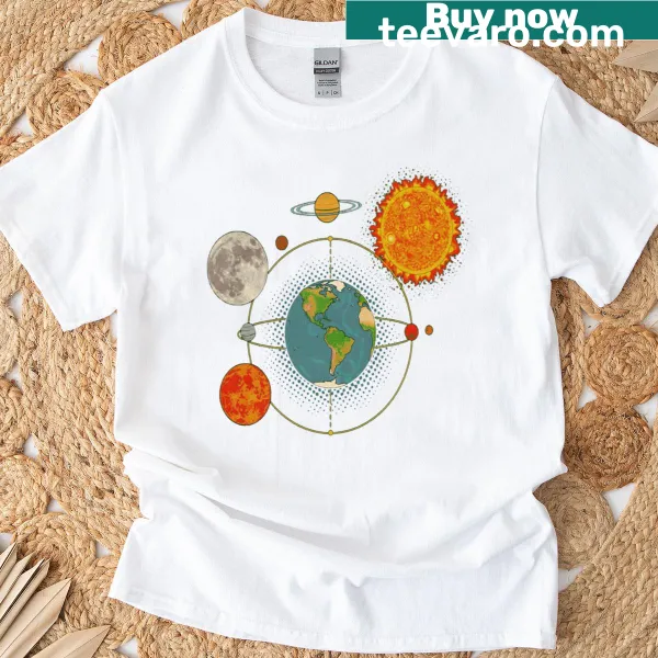 T-shirt with a cosmic graphic of planets and stars.