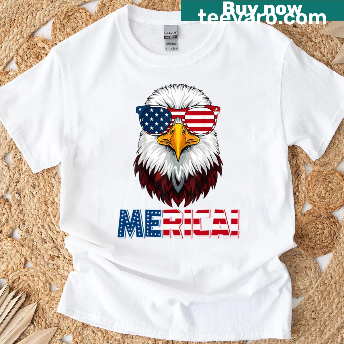 Bald eagle wearing sunglasses against the American flag graphic on T-shirt. — on a men's t-shirt