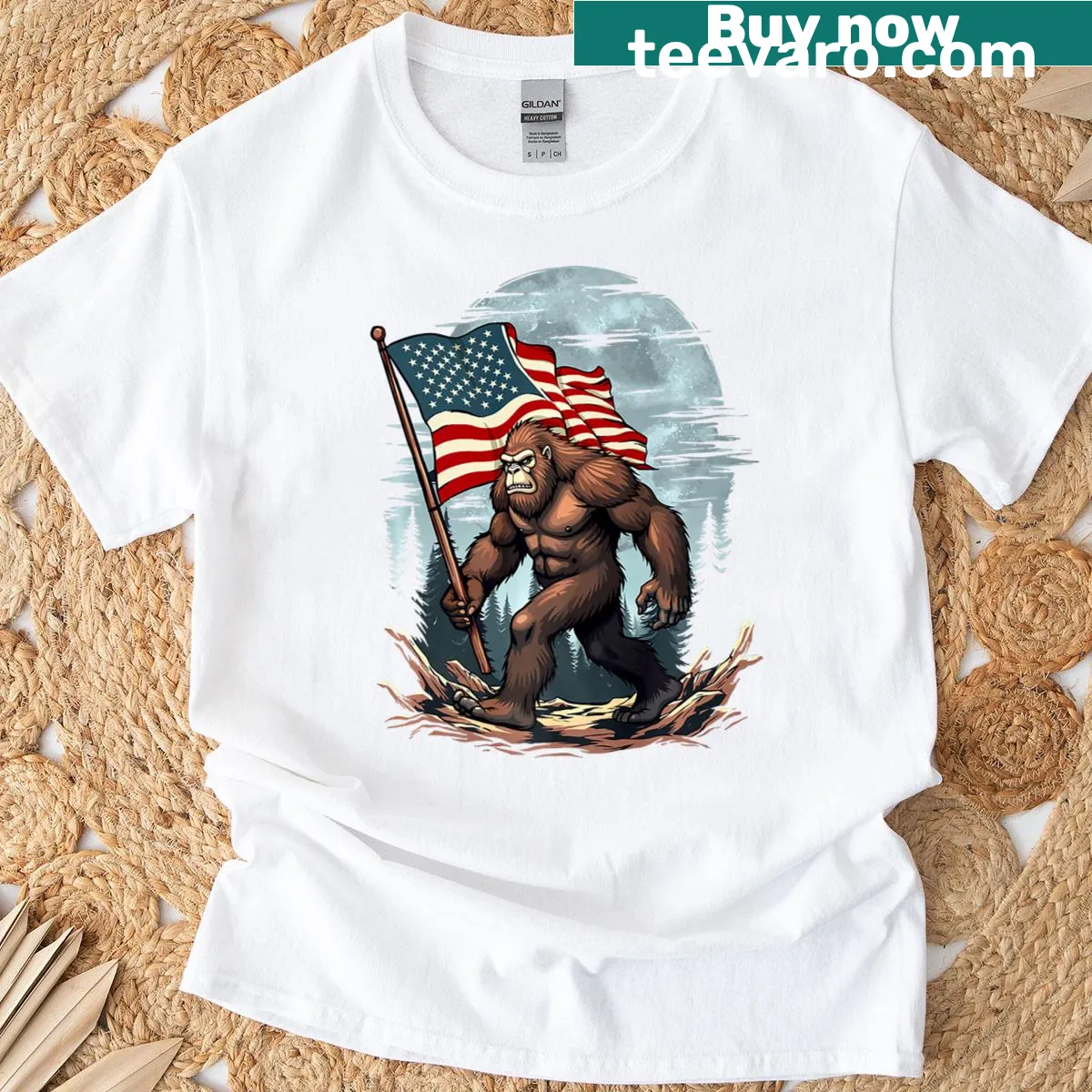 Playful Bigfoot graphic with American flag for 4th of July — on a men's t-shirt