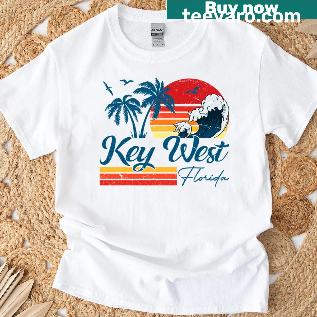 Vintage Key West style T-shirt with tropical beach graphic — on a men's t-shirt