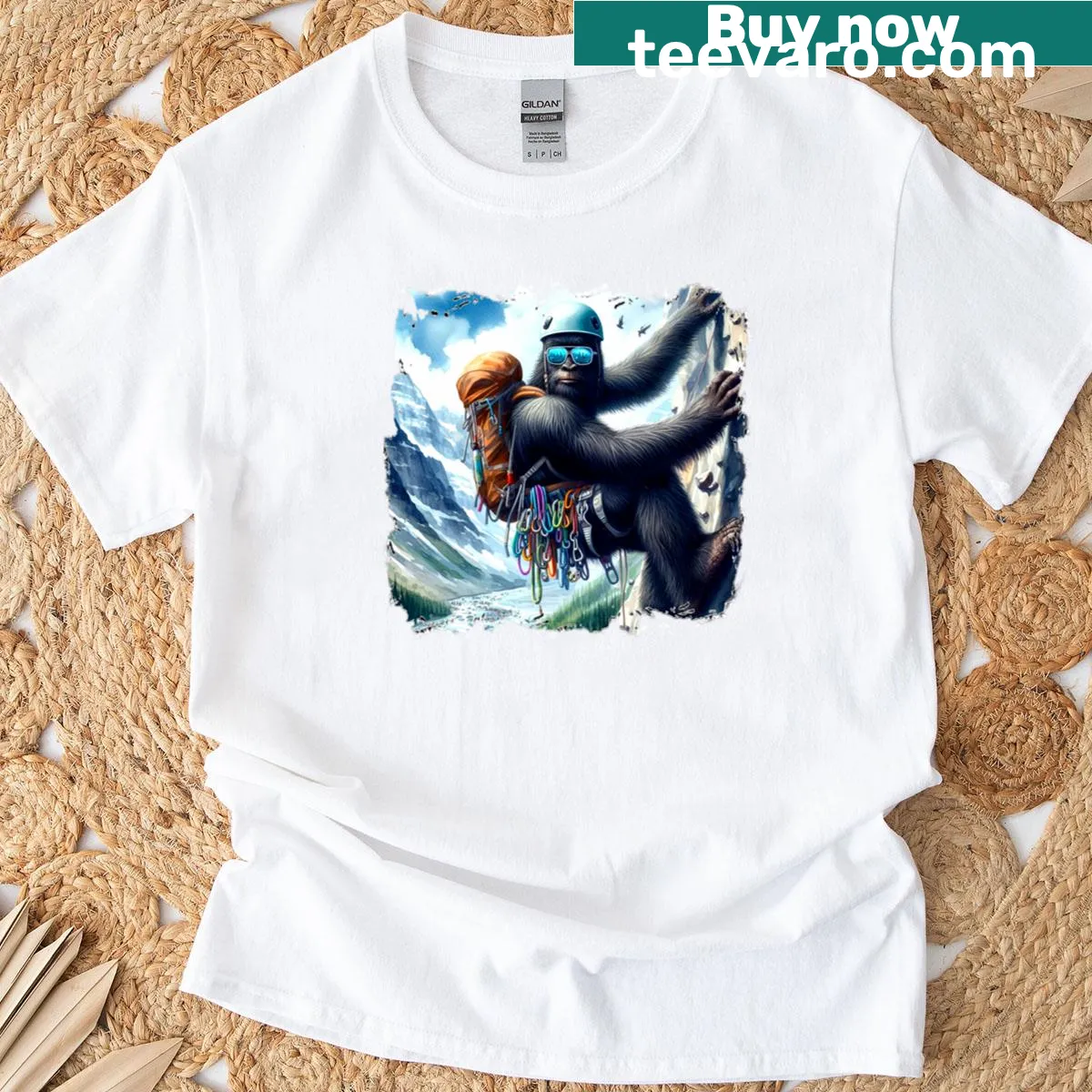 Bigfoot rock climbing graphic on a fun t-shirt — on a men's t-shirt