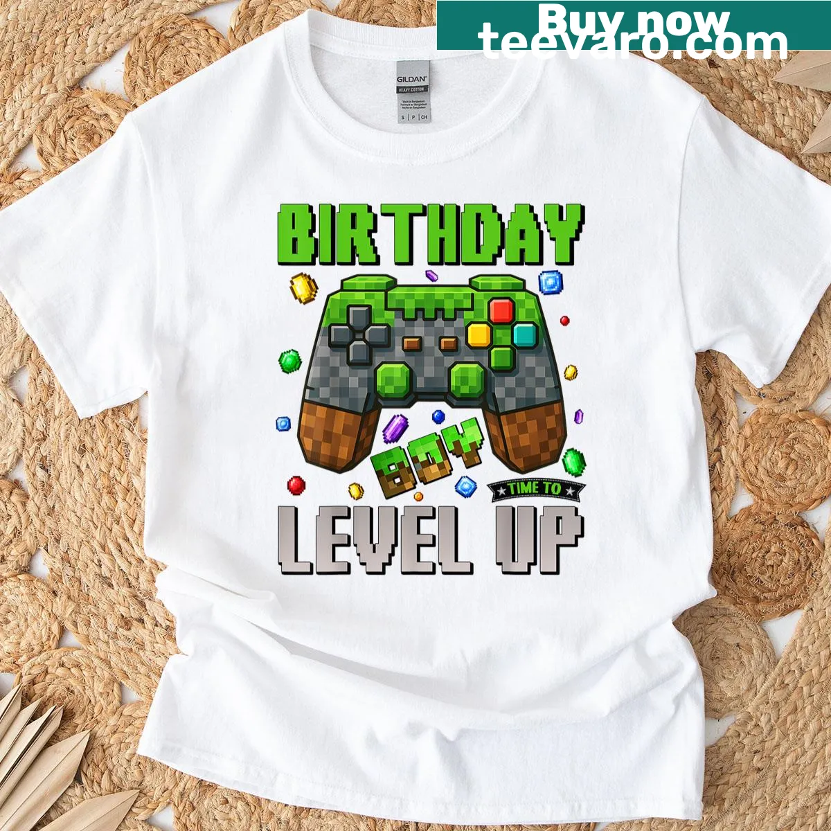 Fun Birthday Boy T-shirt with video game graphics and leveling up theme. — on a men's t-shirt
