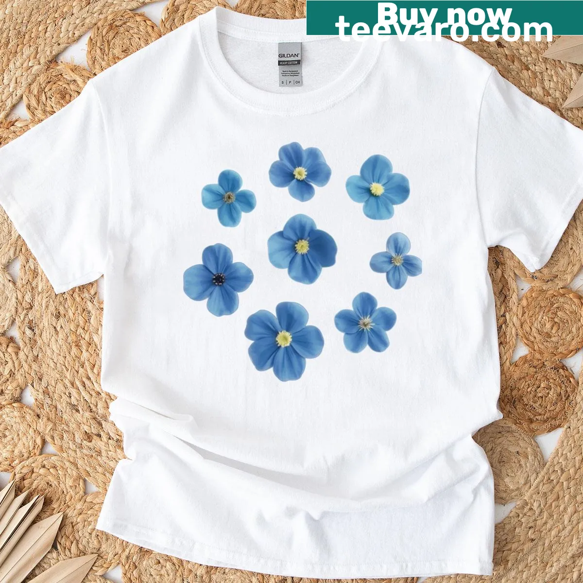 Elegant floral design featuring blue flowers on a T-shirt — on a men's t-shirt