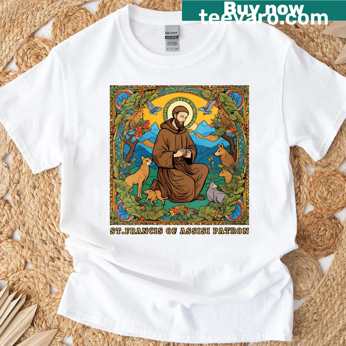 St. Francis of Assisi with nature imagery on a women's t-shirt — on a men's t-shirt