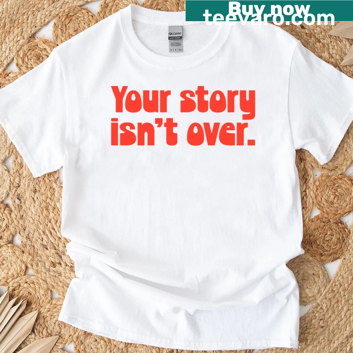 Inspirational 'Your Story Isnt Over' tomato graphic on the t-shirt — on a men's t-shirt
