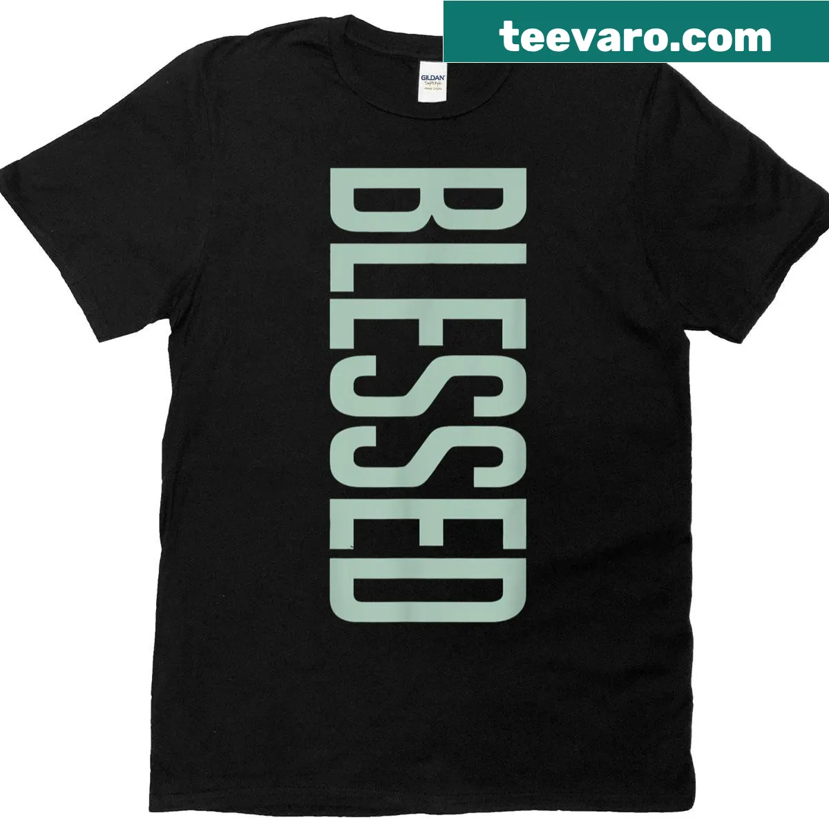 Minimalist Blessed T-shirt in seafoam green and white typography — on a men's t-shirt