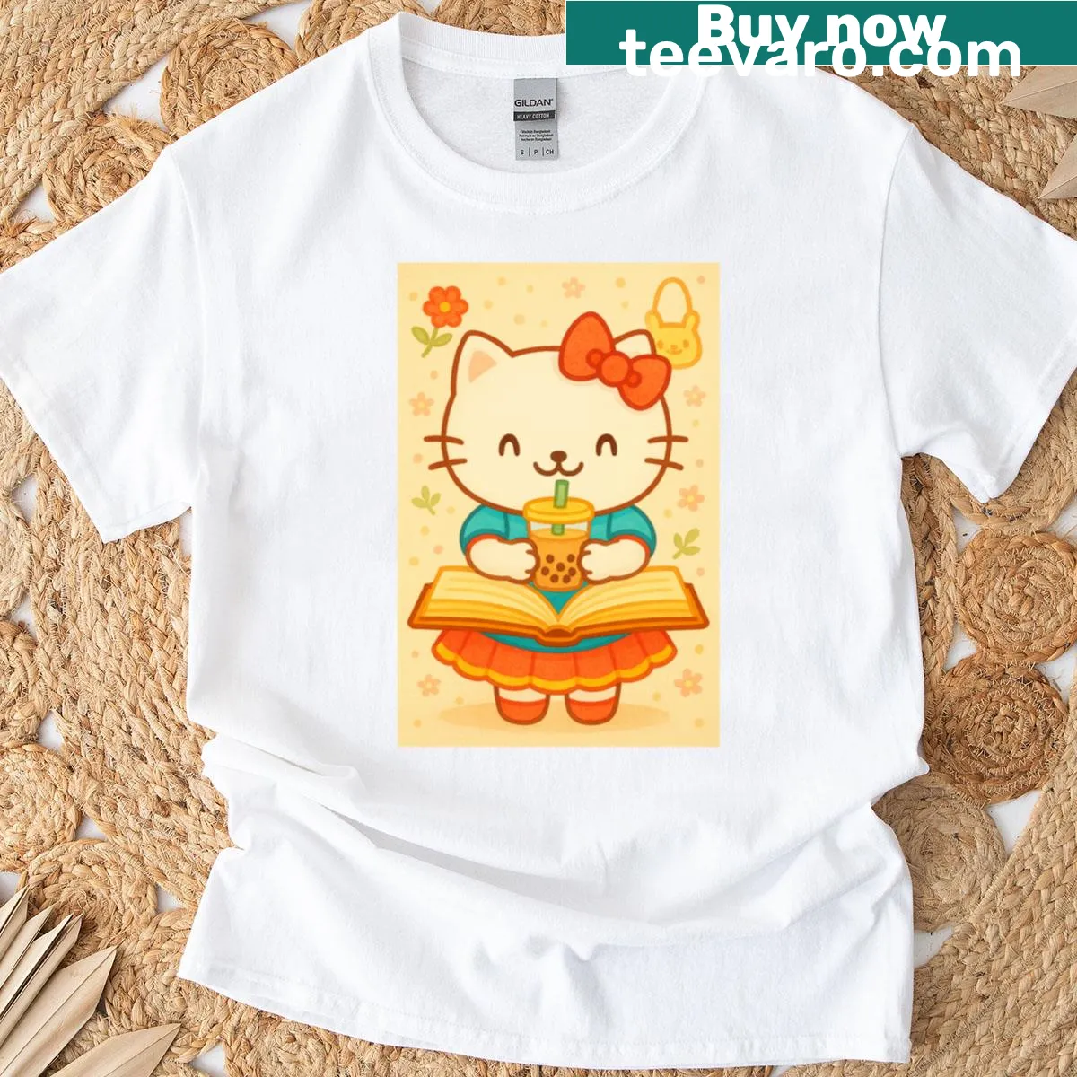 Whimsical illustration of a cat on books drinking boba tea — on a men's t-shirt