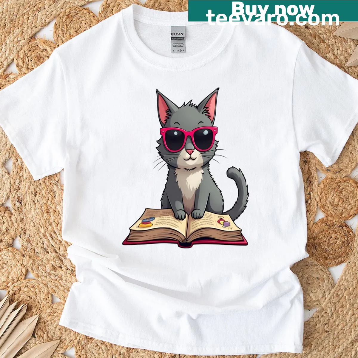 Illustrated cat reading a book on a T-shirt — on a men's t-shirt