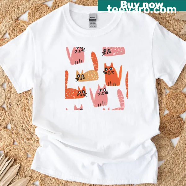 Illustrated t-shirt featuring a variety of playful cartoon cats