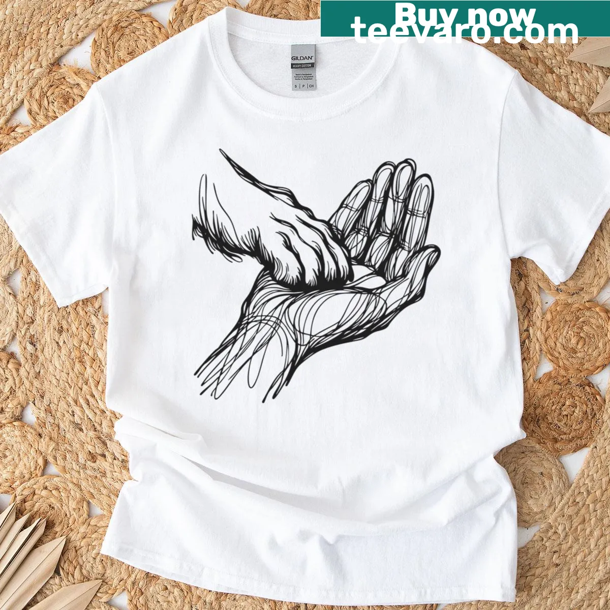 Doodle design of a hand holding a dog's paw on a T-shirt — on a men's t-shirt