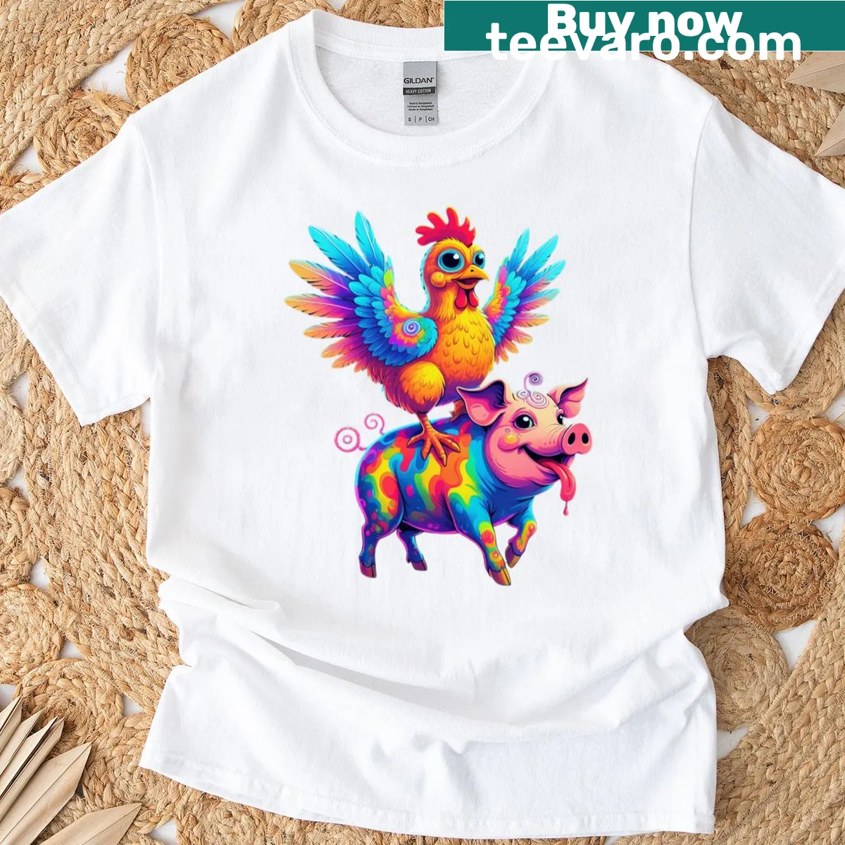 Funny cartoon T-shirt featuring a chicken riding a rainbow pig. — on a men's t-shirt