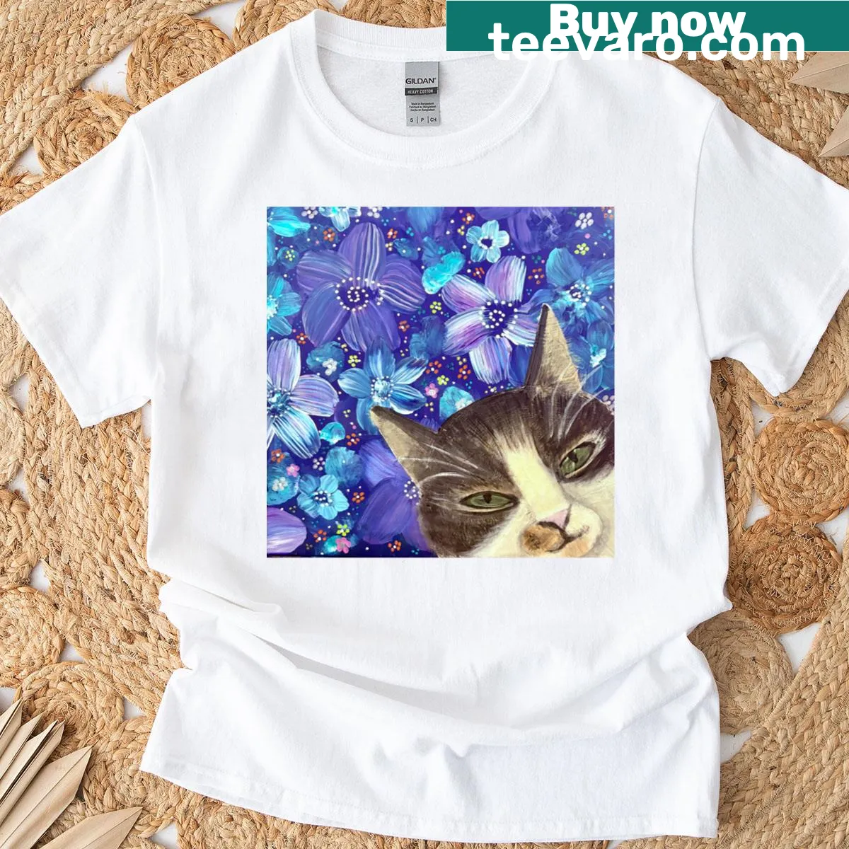 Charming graphic T-shirt featuring a curious cat in a floral design — on a men's t-shirt