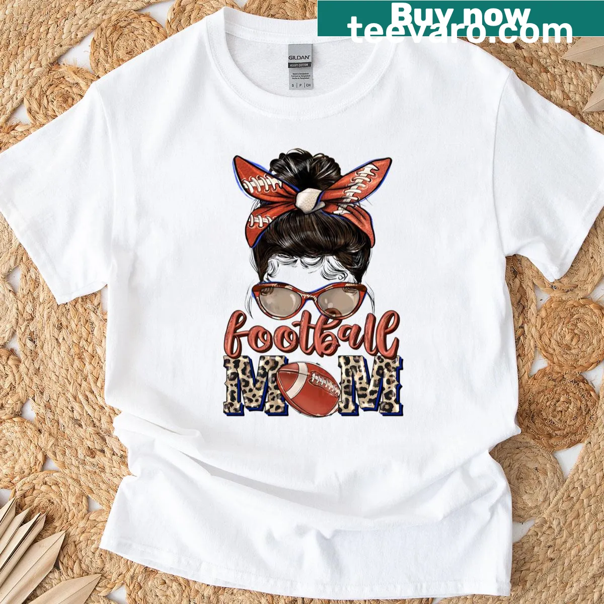 Playful Football Mom t-shirt featuring a messy bun graphic — on a men's t-shirt