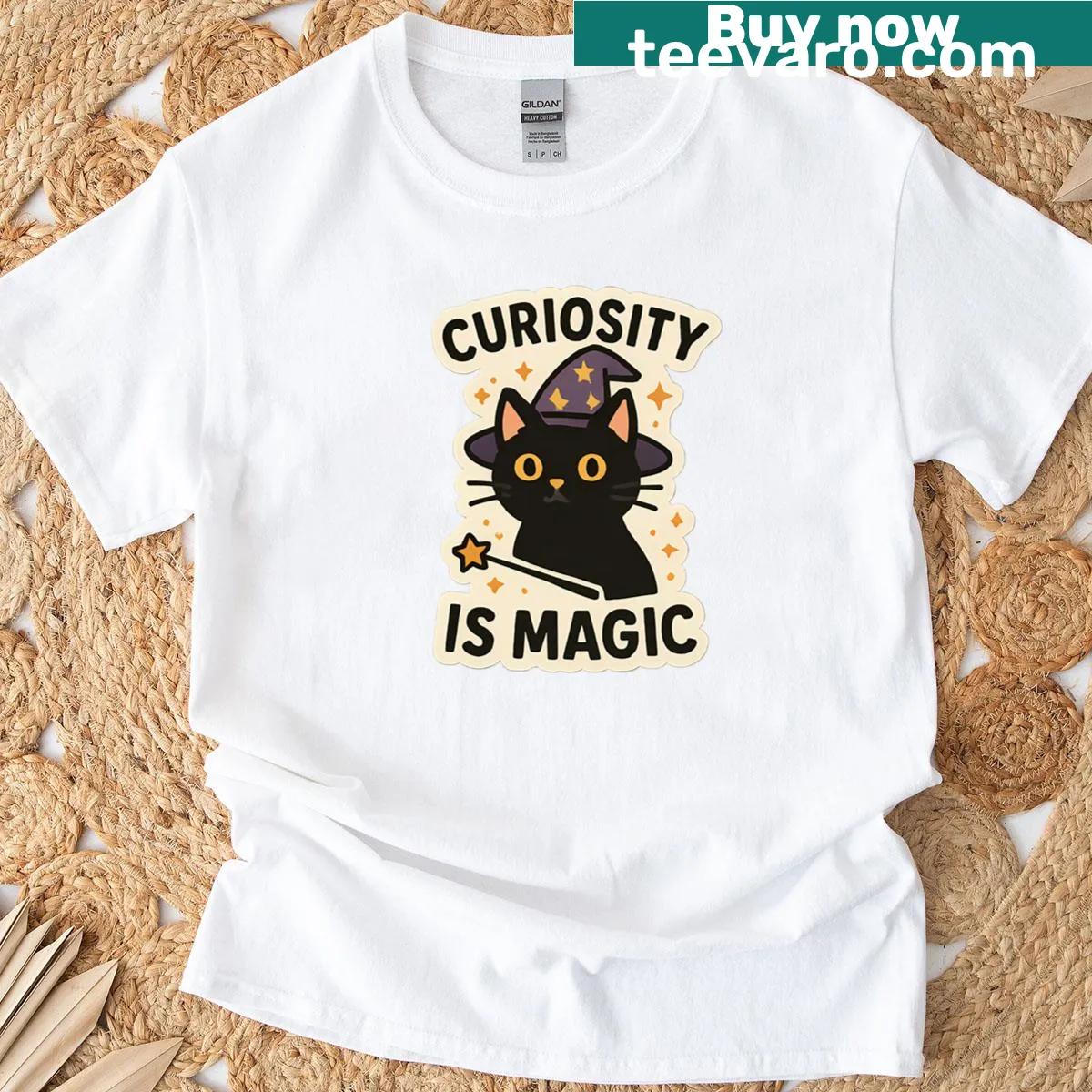 Enchanting T-shirt featuring a whimsical black cat illustration. — on a men's t-shirt