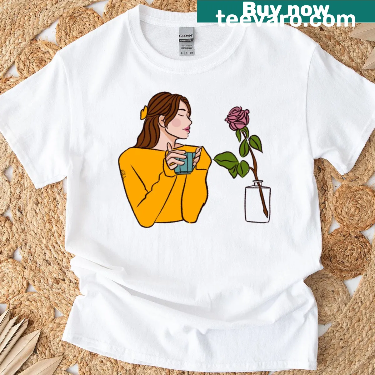 T-shirt featuring a graphic of a woman enjoying coffee — on a men's t-shirt