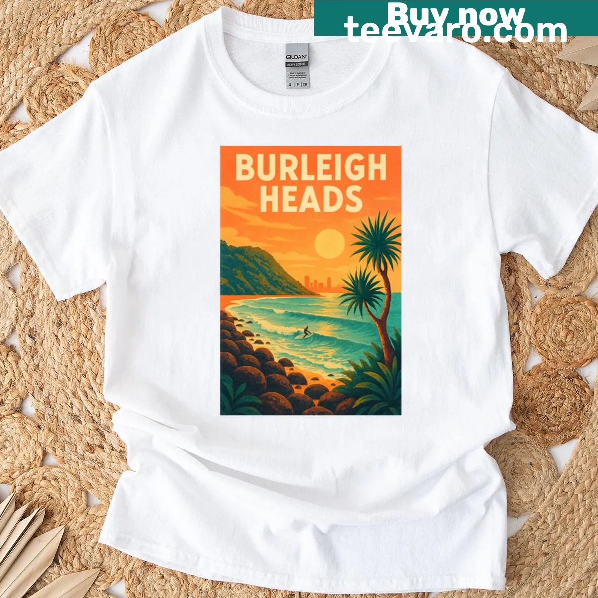 Illustrated T-shirt featuring sunset surf at Burleigh Heads with tropical scenery — on a men's t-shirt