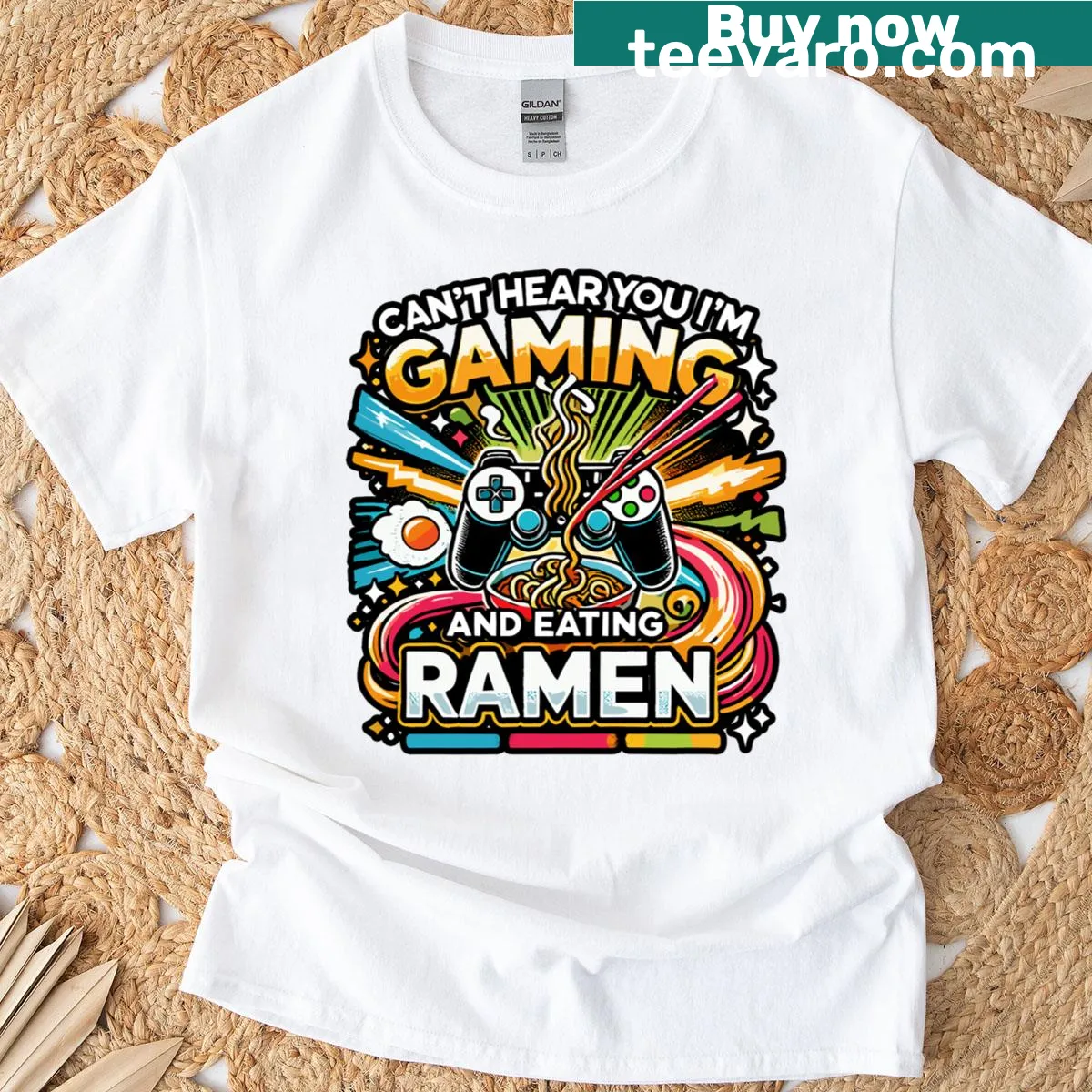 Humorous T-shirt design stating 'Can't Hear You, I'm Gaming and Eating Ramen' — on a men's t-shirt