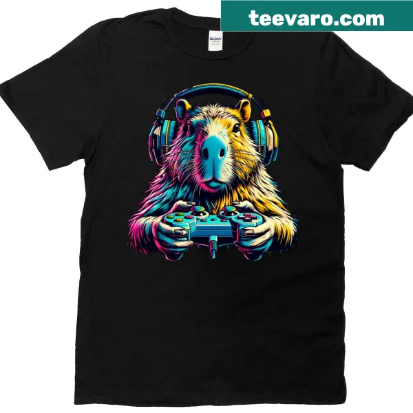 Cartoon capybara graphic t-shirt for gamers with a video game controller