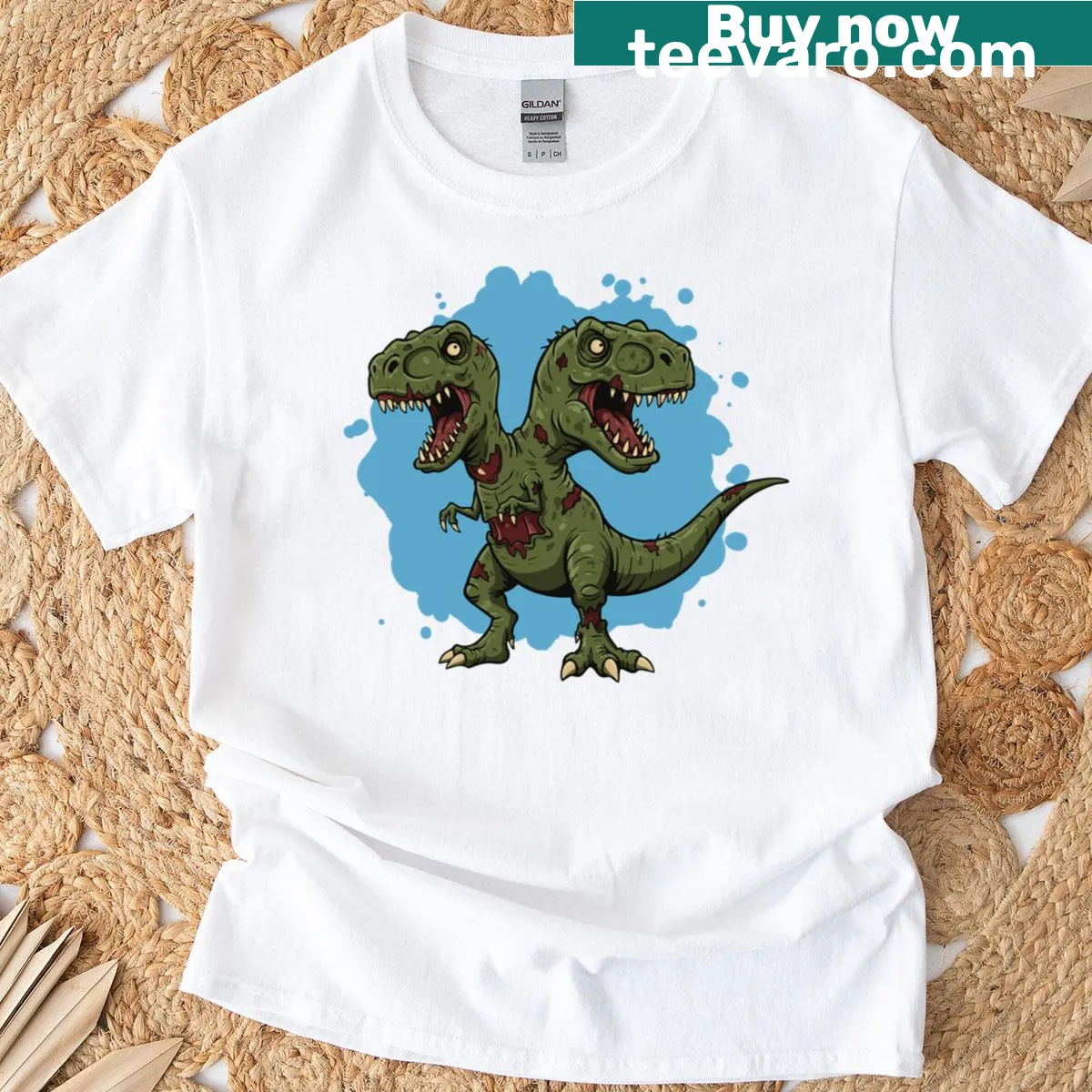 Zombie dinosaur graphic on a T-shirt, featuring bold illustration. — on a men's t-shirt