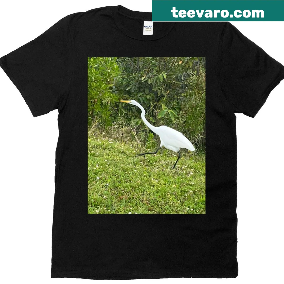 Illustrated t-shirt featuring an elegant egret — on a men's t-shirt