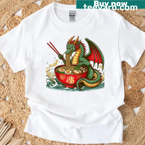 Cute dragon eating ramen noodles in a cartoon style on a T-shirt.