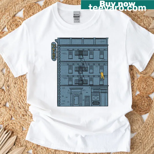 Bold typography design featuring Crux Hotel in blue and yellow on a t-shirt