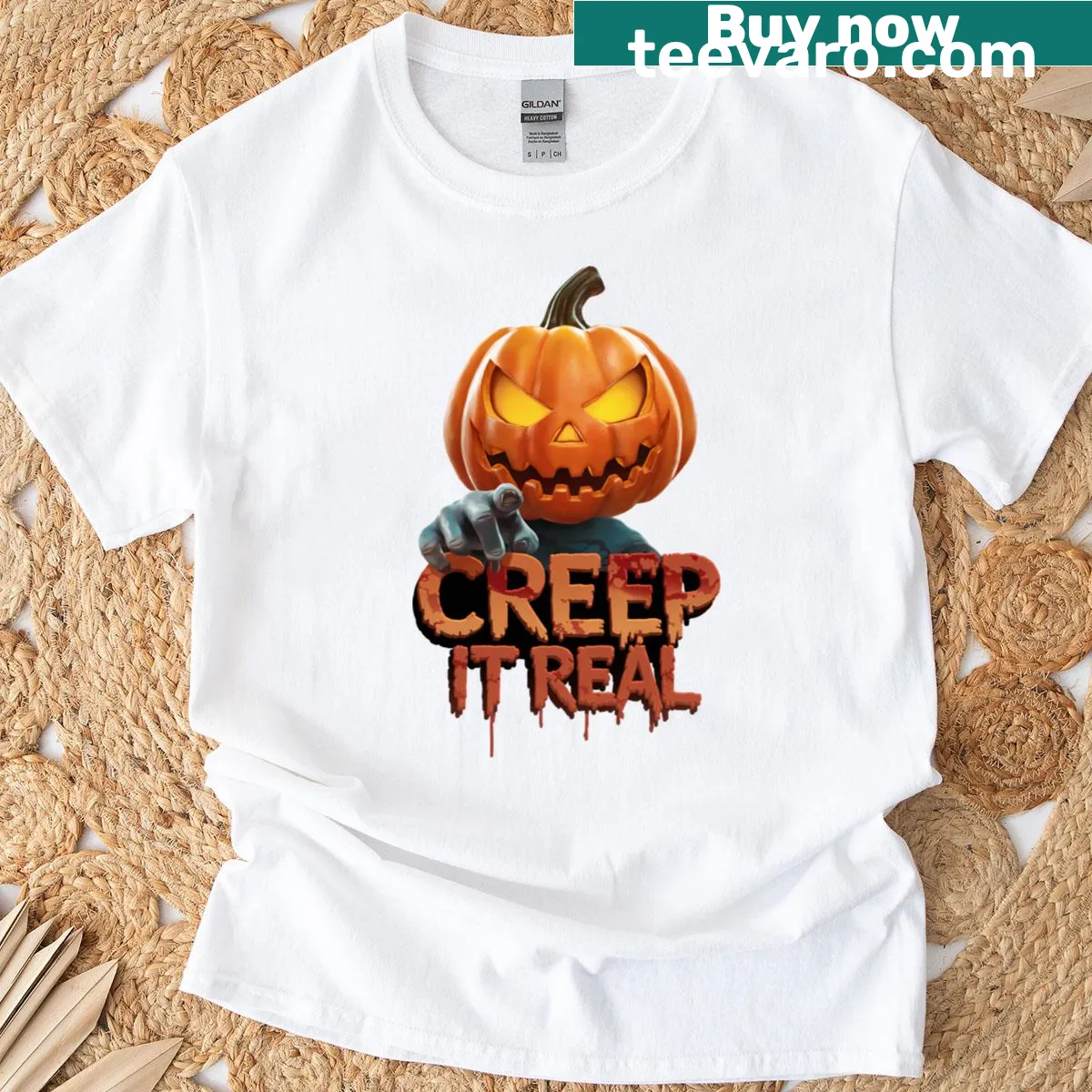 T-shirt featuring a playful pumpkin graphic with 'Creep It Real' text. — on a men's t-shirt